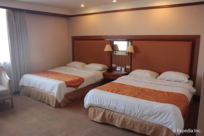 Imagen de la habitación del Hotel Subic International. Foto 12