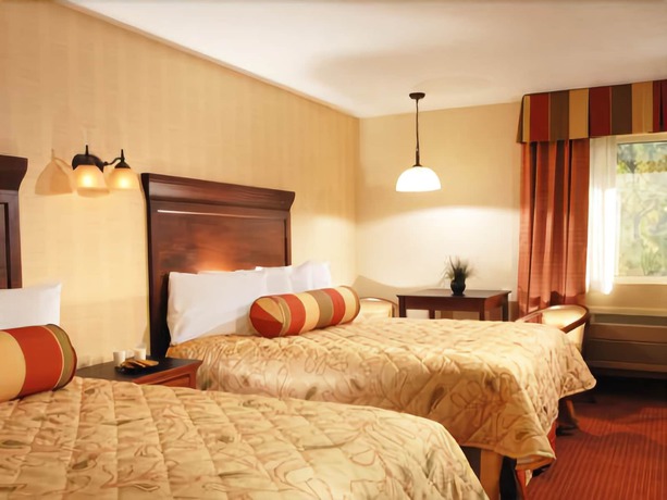 Imagen de la habitación del Hotel Suburban Studios Branson On The Strip. Foto 9