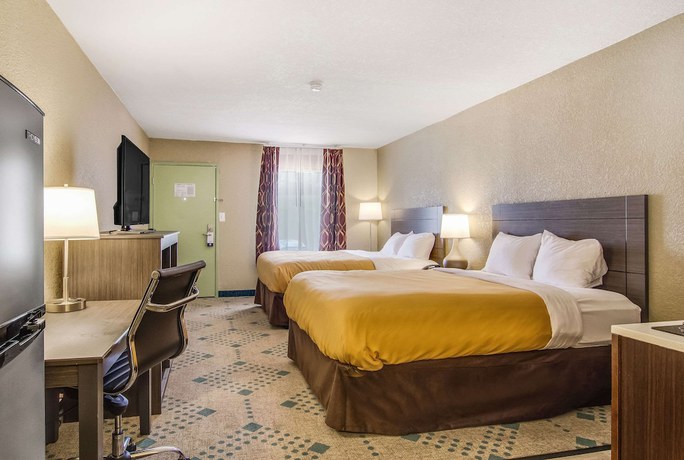 Imagen de la habitación del Hotel Suburban Studios Kingsland Near I-95. Foto 9