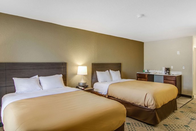Imagen de la habitación del Hotel Suburban Studios Kingsland Near I-95. Foto 12