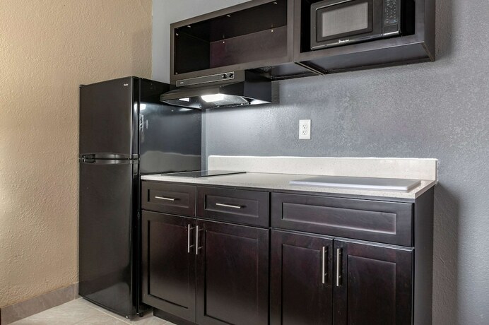 Imagen de la habitación del Hotel Suburban Studios Lafayette. Foto 19
