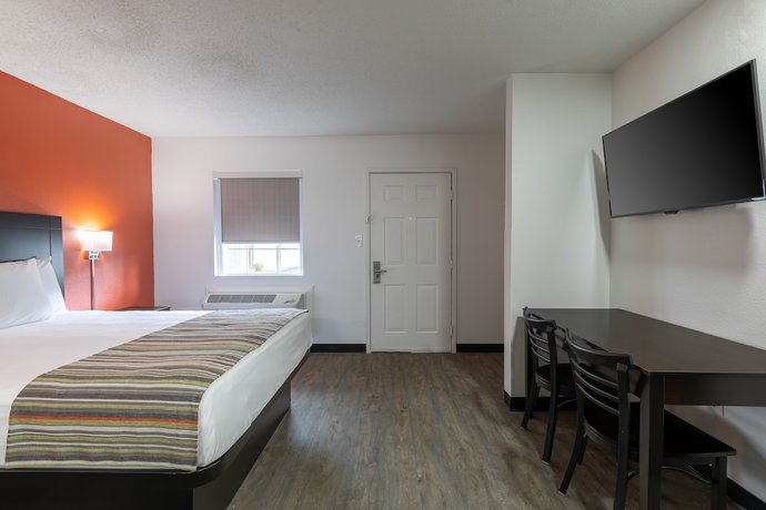 Imagen de la habitación del Hotel Suburban Studios, Spartanburg. Foto 4