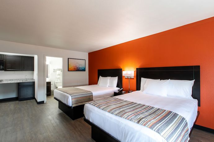 Imagen de la habitación del Hotel Suburban Studios, Spartanburg. Foto 10