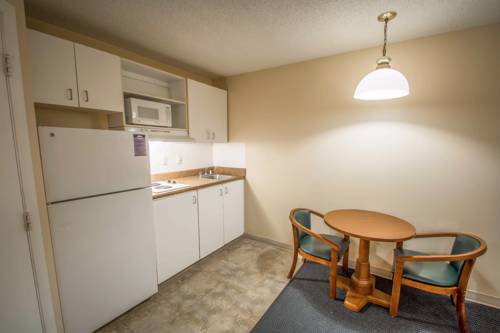 Imagen de la habitación del Hotel Suburban Studios Stuart Near Federal Hwy 1. Foto 6