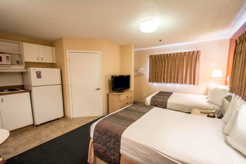 Imagen de la habitación del Hotel Suburban Studios Stuart Near Federal Hwy 1. Foto 12