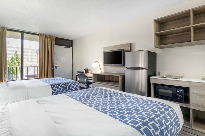 Imagen de la habitación del Hotel Suburban Studios Tysons Corner. Foto 13