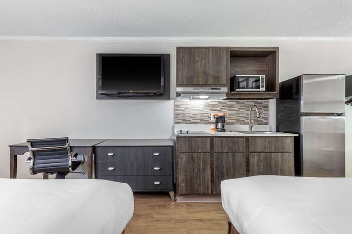 Imagen de la habitación del Hotel Suburban Studios at the University. Foto 6