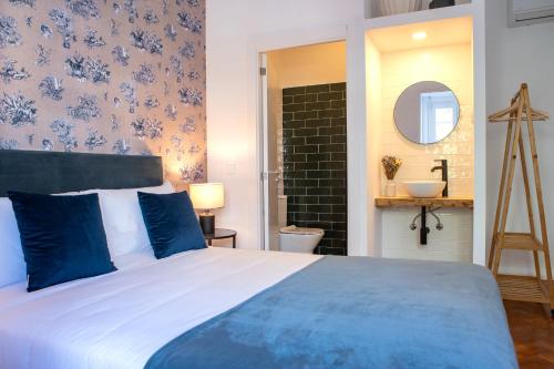 Imagen de la habitación del Hotel Succeed Campo Pequeno Suites. Foto 13