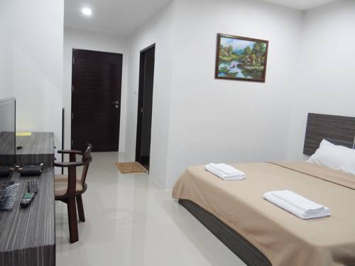 Imagen de la habitación del Hotel Suchada Palace. Foto 7