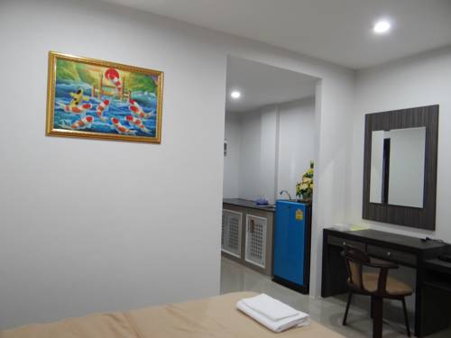 Imagen de la habitación del Hotel Suchada Palace. Foto 11