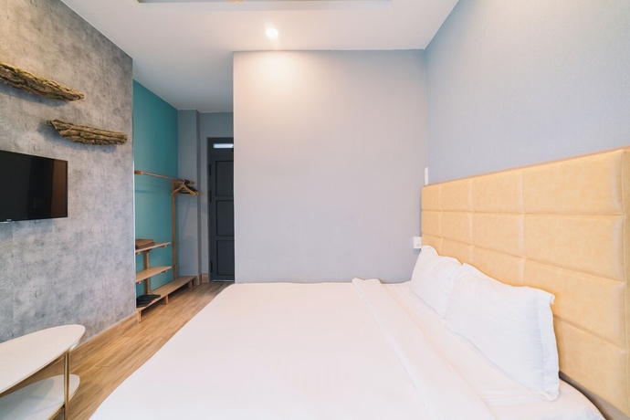 Imagen de la habitación del Hotel Suda House. Foto 9
