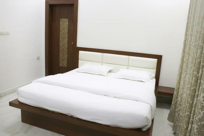Imagen de la habitación del Hotel Sudishti Holiday Homes and Farms. Foto 4