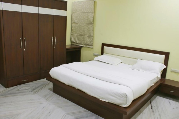 Imagen de la habitación del Hotel Sudishti Holiday Homes and Farms. Foto 6