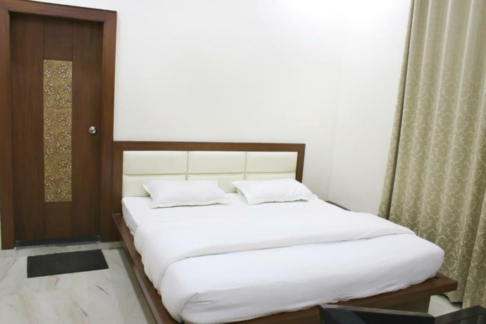 Imagen de la habitación del Hotel Sudishti Holiday Homes and Farms. Foto 9