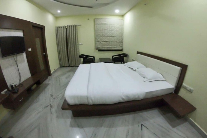 Imagen de la habitación del Hotel Sudishti Holiday Homes and Farms. Foto 11