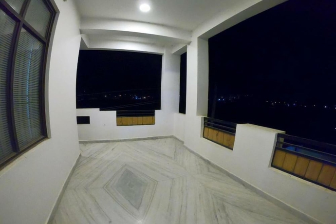 Imagen de la habitación del Hotel Sudishti Holiday Homes and Farms. Foto 12