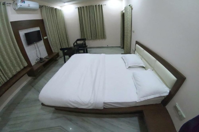 Imagen de la habitación del Hotel Sudishti Holiday Homes and Farms. Foto 13