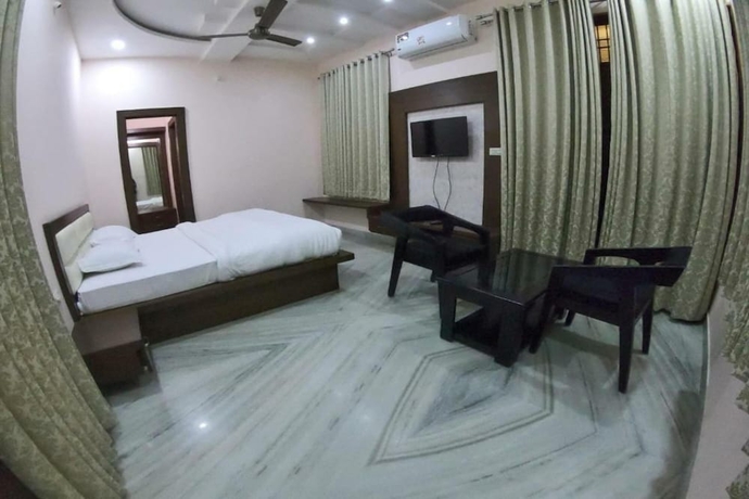 Imagen de la habitación del Hotel Sudishti Holiday Homes and Farms. Foto 15