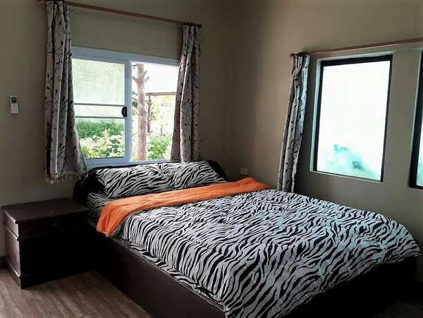 Imagen de la habitación del Hotel Suepuen Monbai Resort. Foto 19