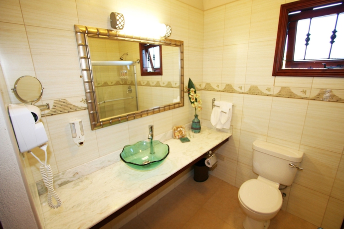 Imagen de la habitación del Hotel Sugar Cane Club and Spa - Adults Only. Foto 8