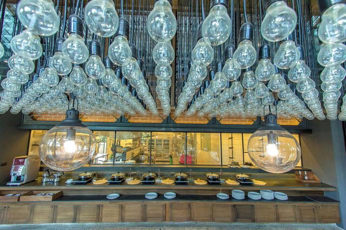 Imagen del bar/restaurante del Hotel Sugar Marina Resort - AVIATOR - Phuket Airport. Foto 3