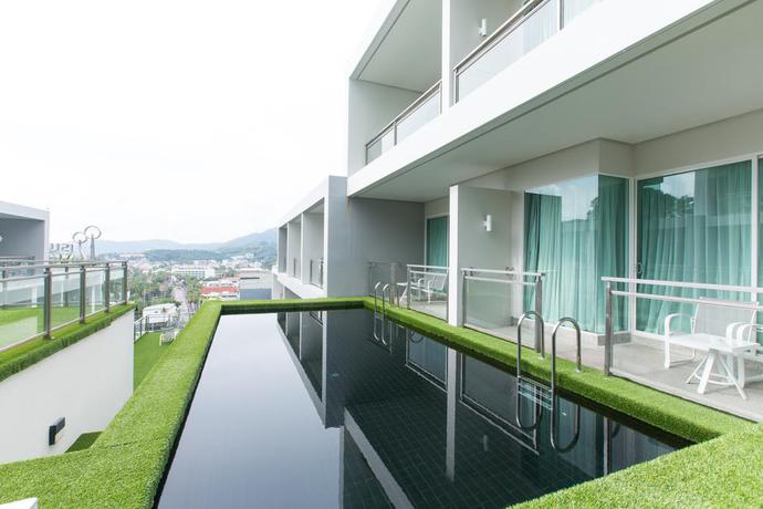 Imagen de la habitación del Hotel Sugar Palm Grand Hillside. Foto 5