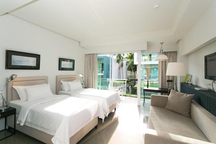 Imagen de la habitación del Hotel Sugar Palm Grand Hillside. Foto 6