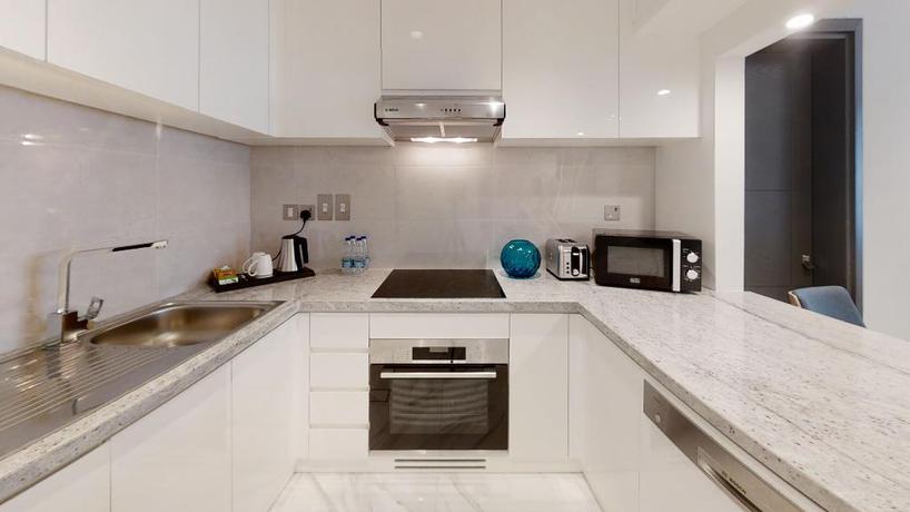 Imagen de la habitación del Hotel Suha Mina Rashid Hotel Apartments. Foto 6