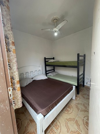 Imagen de la habitación del Hotel Su&iacute;tes Bertioga. Foto 6