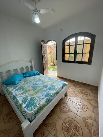 Imagen de la habitación del Hotel Su&iacute;tes Bertioga. Foto 15
