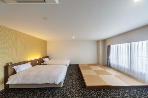 Imagen de la habitación del Hotel Suikouen. Foto 15