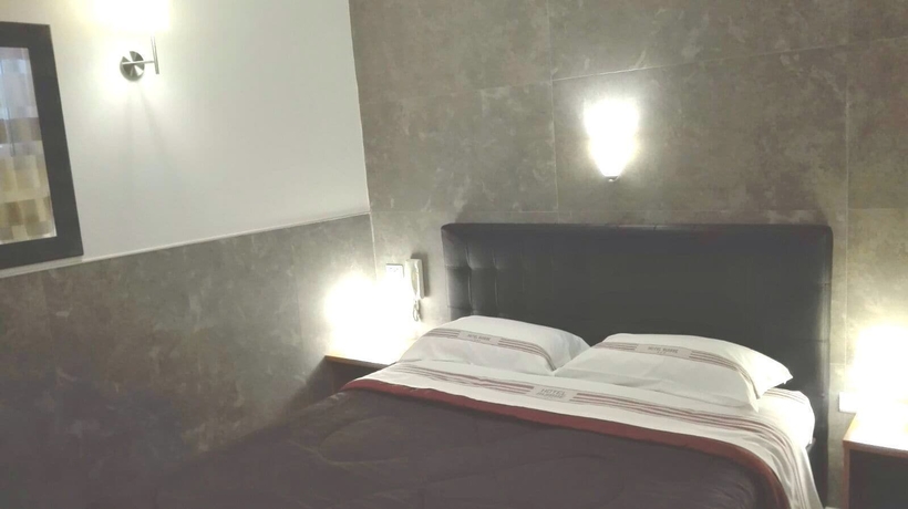 Imagen de la habitación del Hotel Suisse, Lago Patria. Foto 11