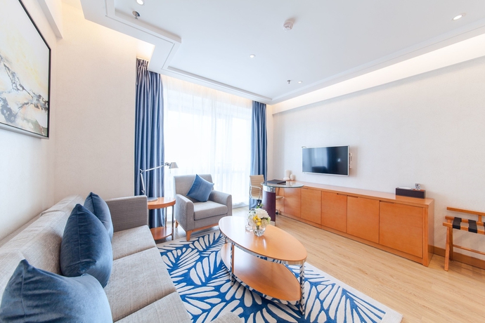 Imagen de la habitación del Hotel Suisse Place Residence Cmctaizhou. Foto 12