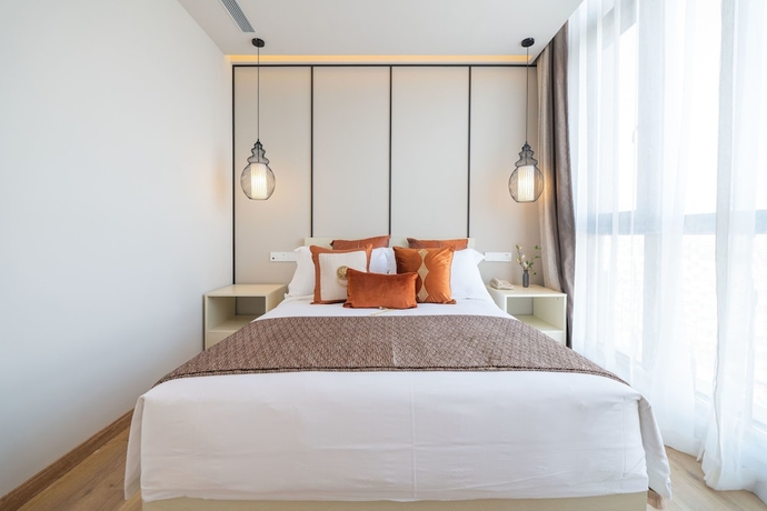 Imagen de la habitación del Hotel Suisse Place Shanghai. Foto 7