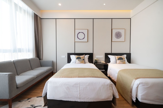 Imagen de la habitación del Hotel Suisse Place Shanghai. Foto 11