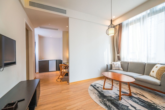 Imagen de la habitación del Hotel Suisse Place Shanghai. Foto 15
