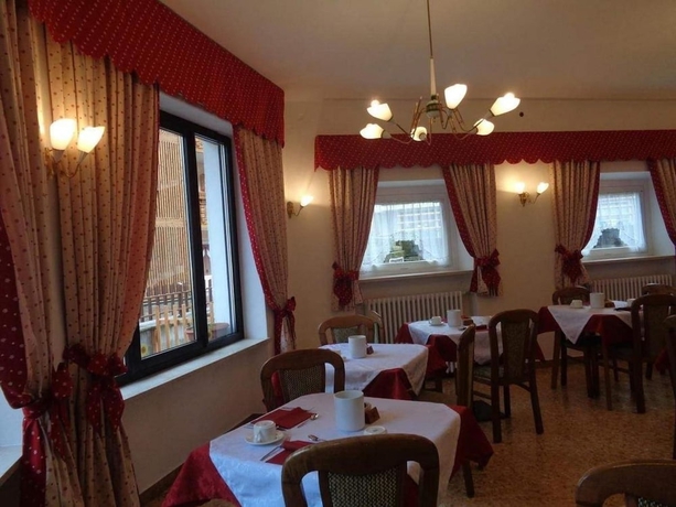 Imagen del bar/restaurante del Hotel Suisse, San Martino di Castrozza. Foto 3