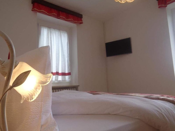 Imagen de la habitación del Hotel Suisse, San Martino di Castrozza. Foto 14