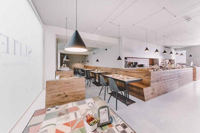 Imagen del bar/restaurante del Hotel Suite 10 Home Design and Spa. Foto 4