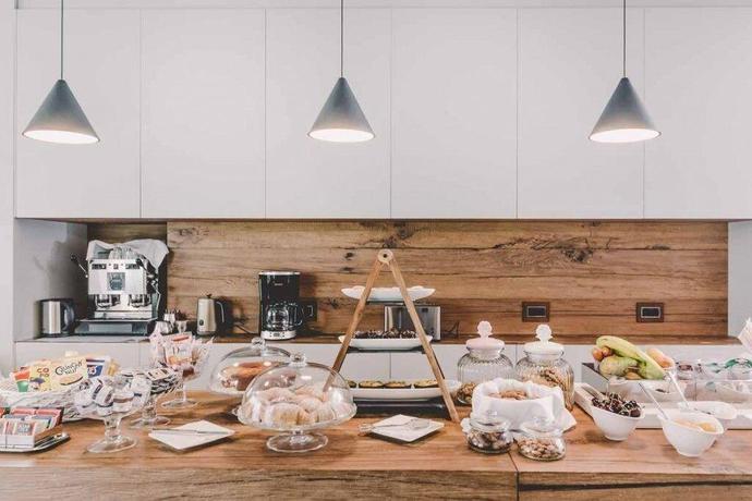 Imagen del bar/restaurante del Hotel Suite 10 Home Design and Spa. Foto 5