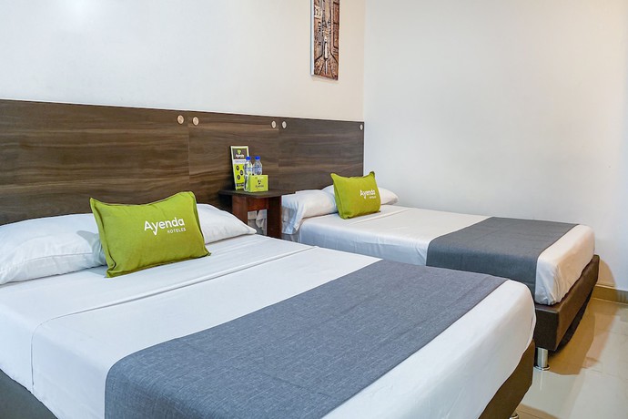 Imagen de la habitación del Hotel Suite Center Pereira. Foto 3