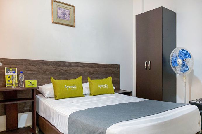 Imagen de la habitación del Hotel Suite Center Pereira. Foto 5