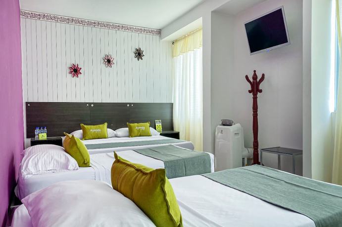 Imagen de la habitación del Hotel Suite Center Pereira. Foto 7