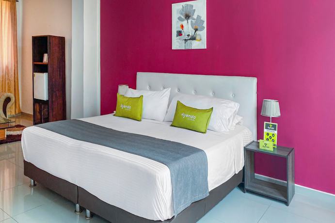 Imagen de la habitación del Hotel Suite Center Pereira. Foto 9