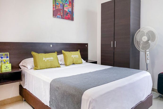 Imagen de la habitación del Hotel Suite Center Pereira. Foto 10