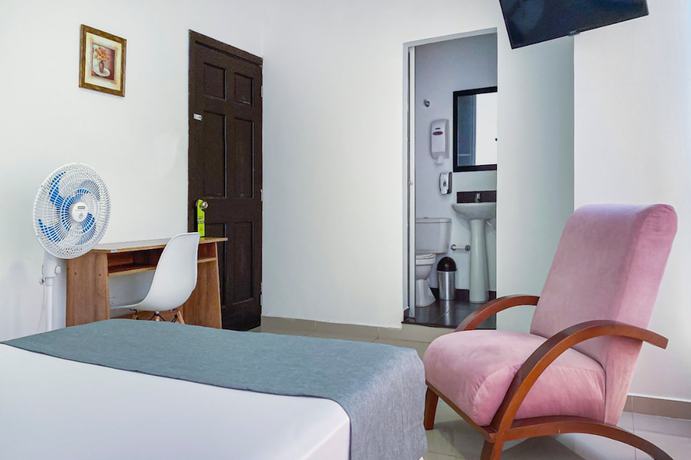 Imagen de la habitación del Hotel Suite Center Pereira. Foto 11