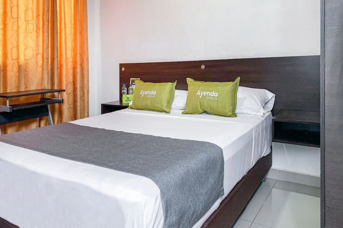 Imagen de la habitación del Hotel Suite Center Pereira. Foto 14