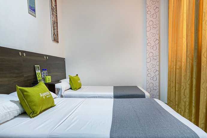 Imagen de la habitación del Hotel Suite Center Pereira. Foto 15