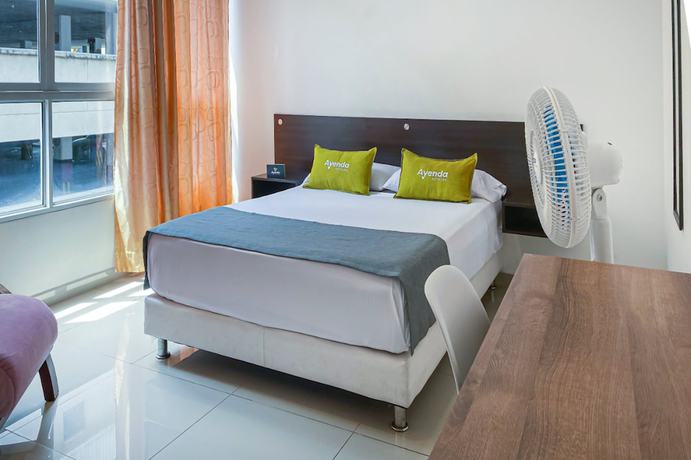 Imagen de la habitación del Hotel Suite Center Pereira. Foto 16