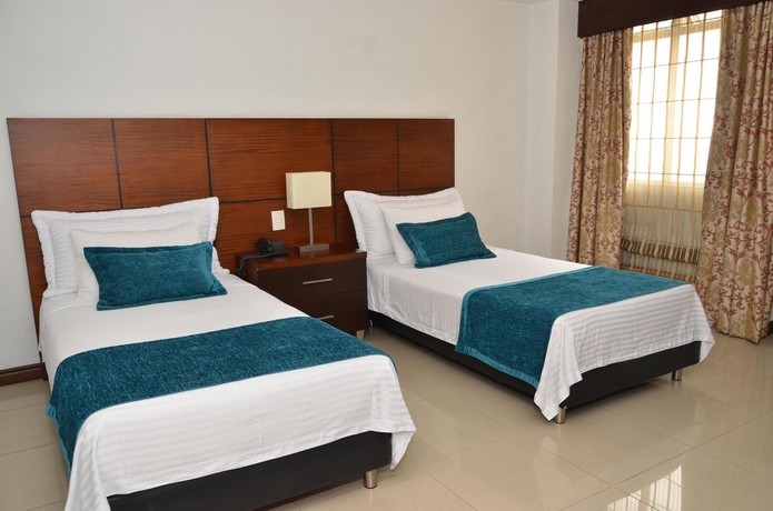 Imagen de la habitación del Hotel Suite Comfort. Foto 10